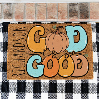 A doormat with a design that says God is so good which the O in God is a pumpkin and the custom name RICHARDSON is on the far left