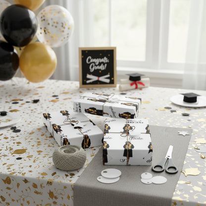 Graduation-themed gift wrap with a person in cap and gown, 'Congrats' text, and 'Class of 2026' on a white background.