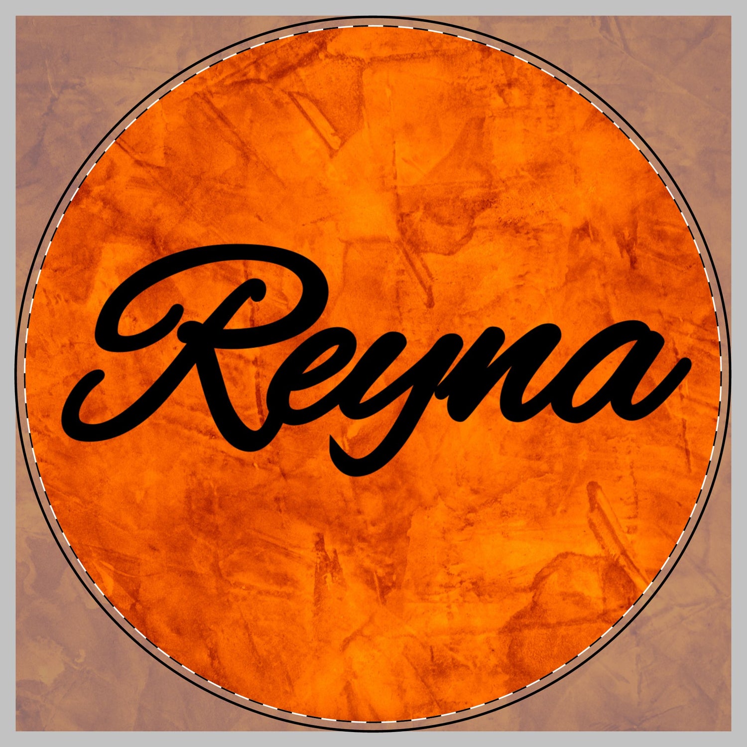 A circular orange textured design with the name 'Reyna' in black script across the center on a cutting board