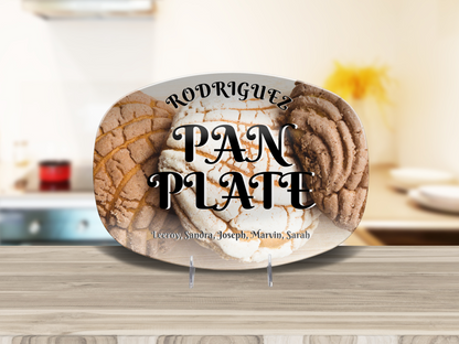Decorative plate with pan dulce design and personalized text on a kitchen counter.
